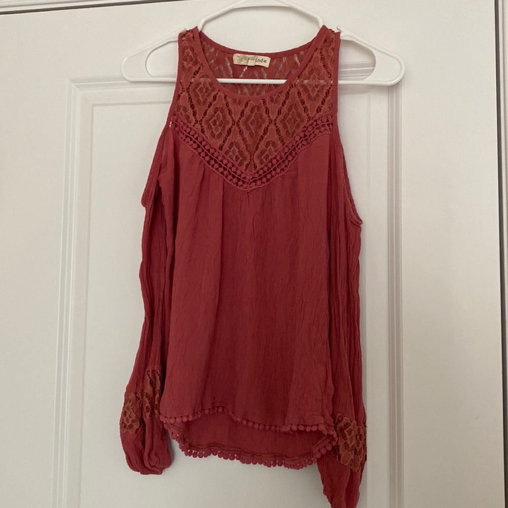 Rewind long sleeve shirt with shoulder cut outs. Size XS.